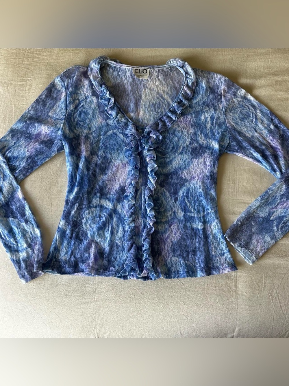 CLIO Blue Ruffle-Front Lace Top